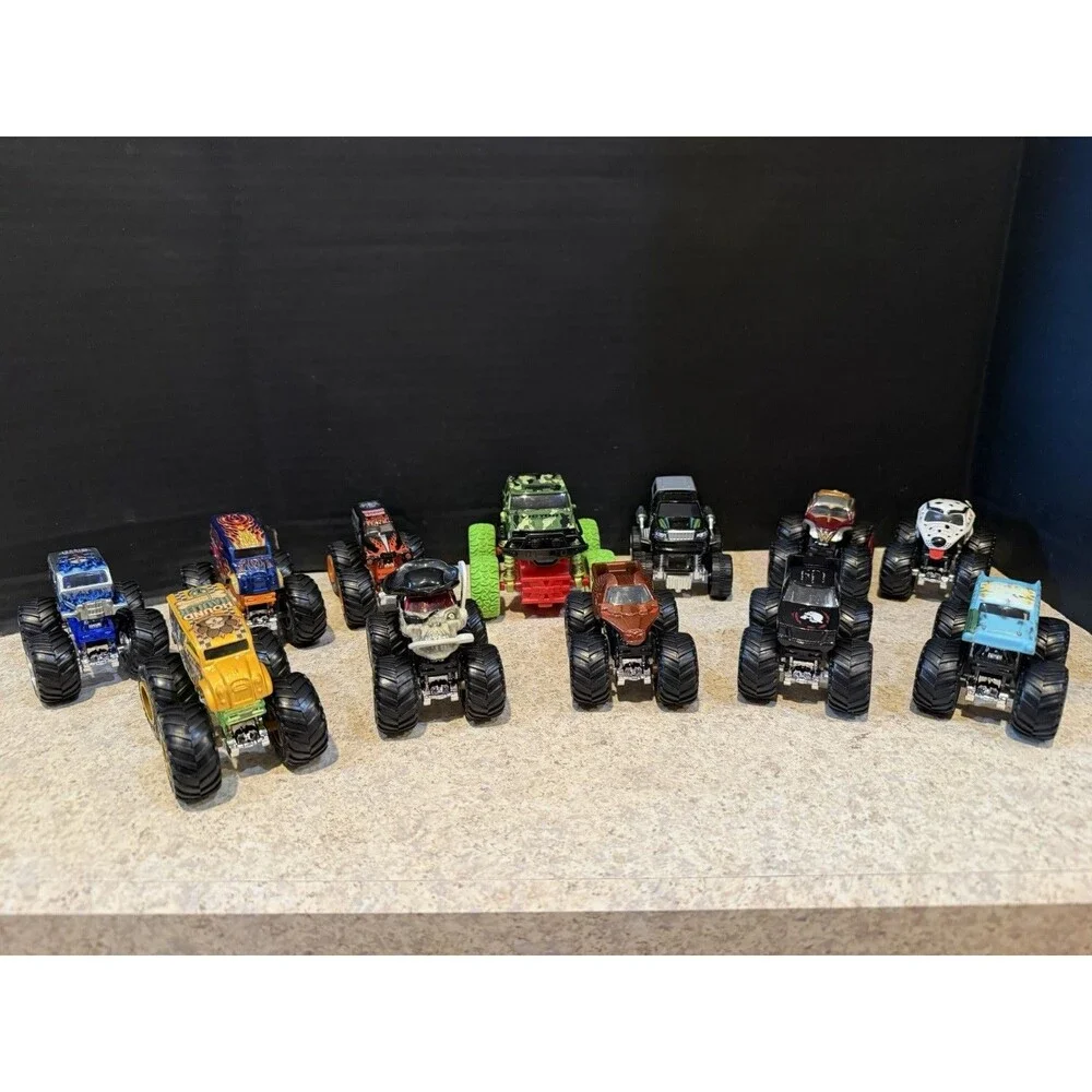 Hot Wheels Monster Trucks Lot of 12 1:64 Wonder Woman Skull Camo Flame Mixed